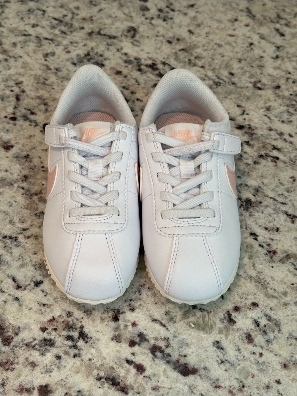 Nike Kids White Sneakers with Light Pink Swoosh